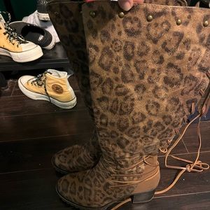 Knee high cheetah print boots